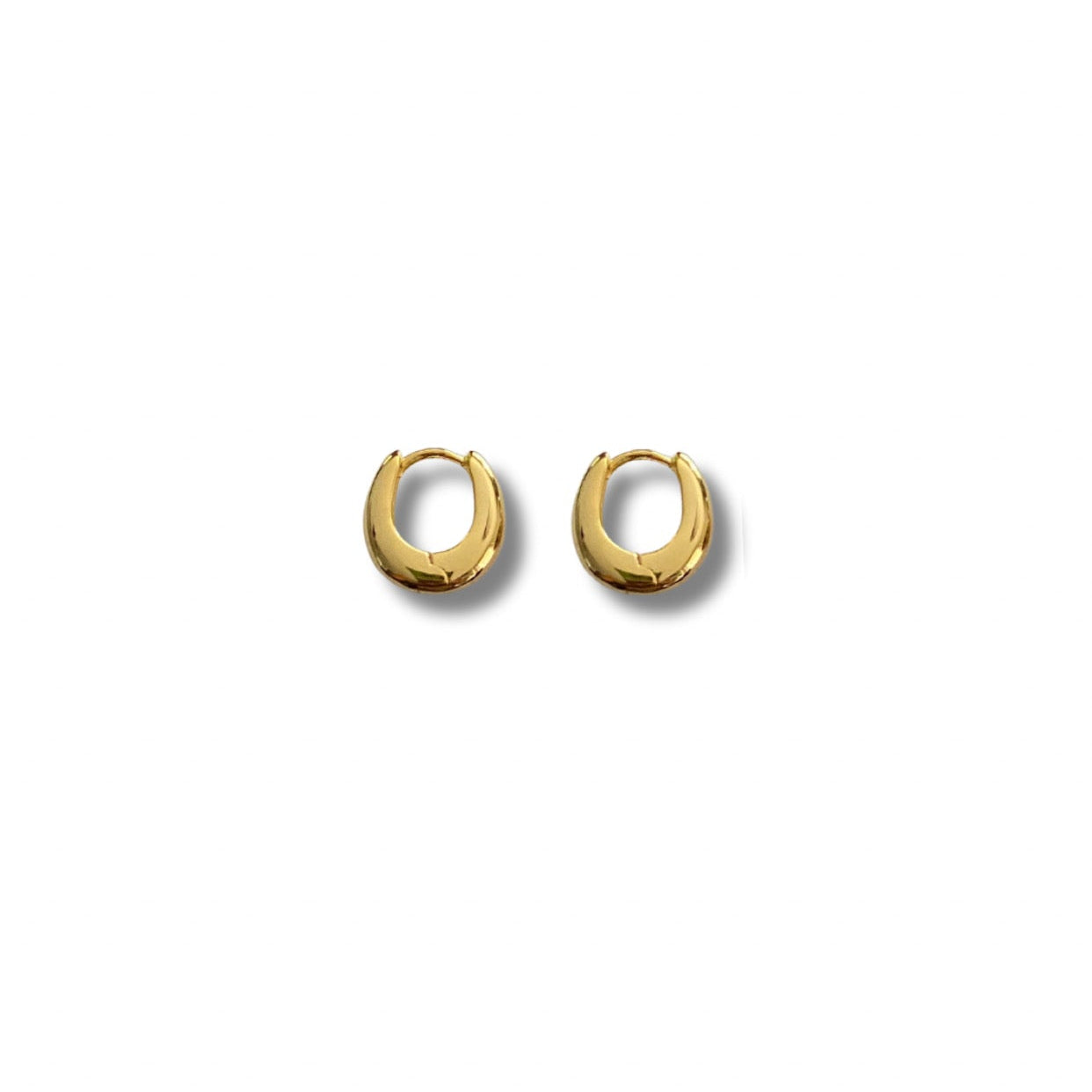 Gold hoop earrings on a white background