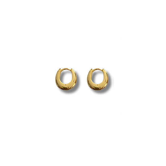 Gold hoop earrings on a white background