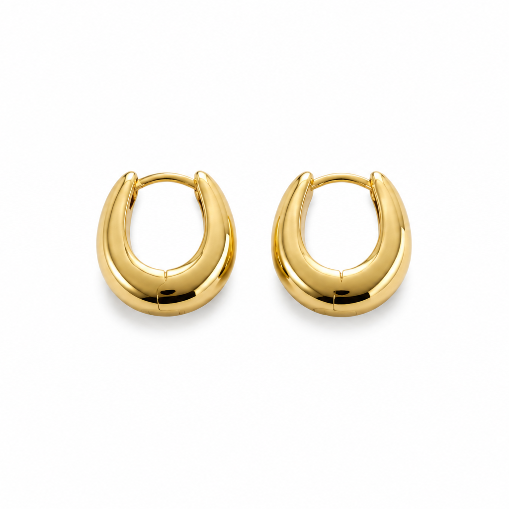 Pair of gold hoop earrings on a white background