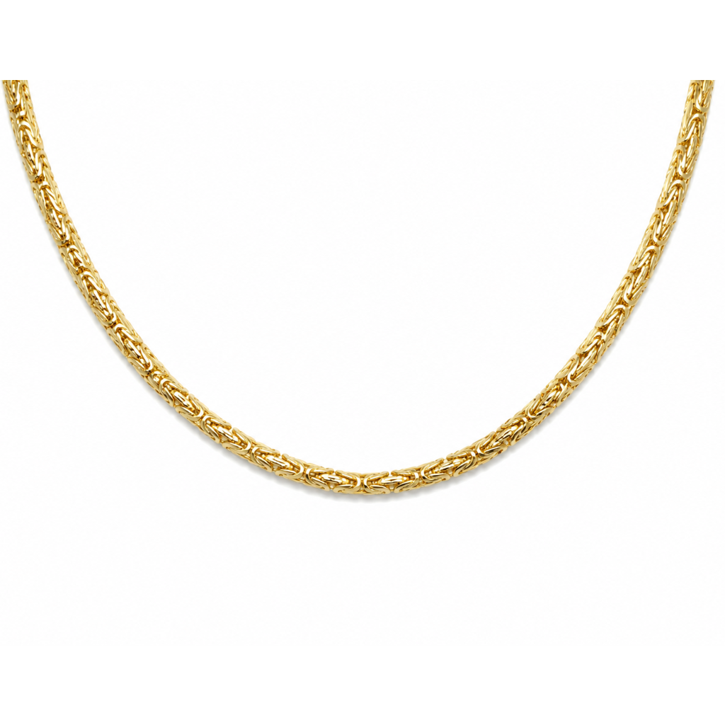 Gold chain necklace on a white background