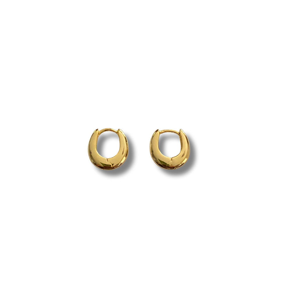 Gold hoop earrings on a white background