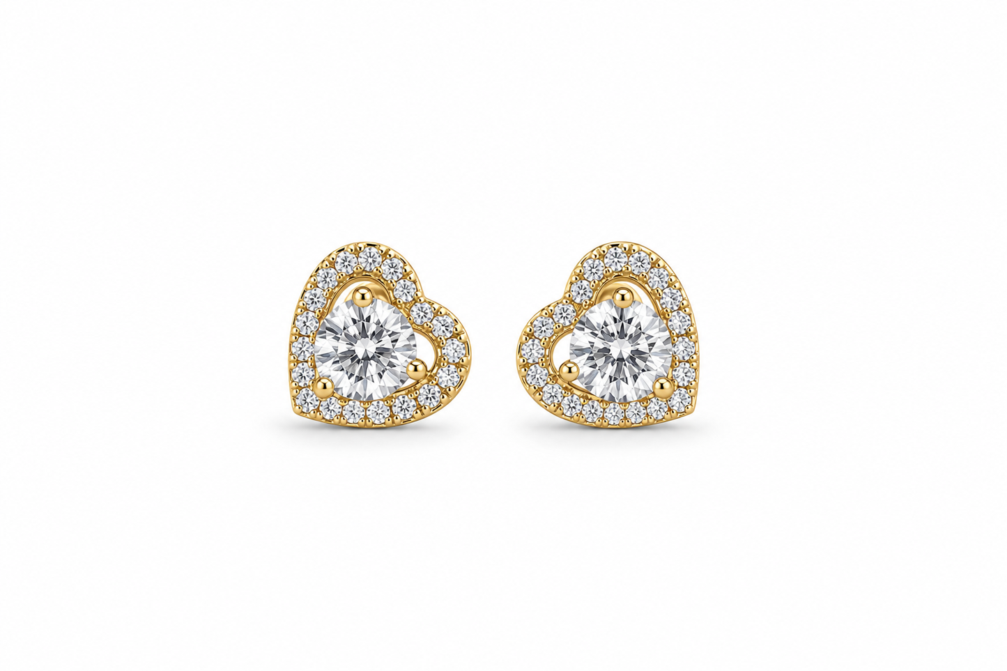 Heart-shaped diamond earrings on a white background