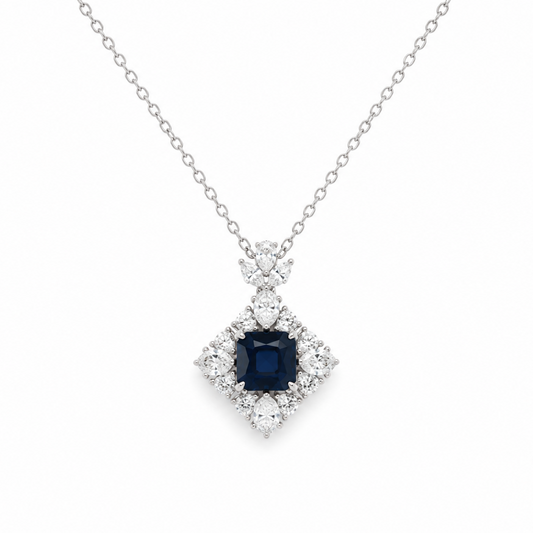 Diamond necklace with a blue gemstone on a white background