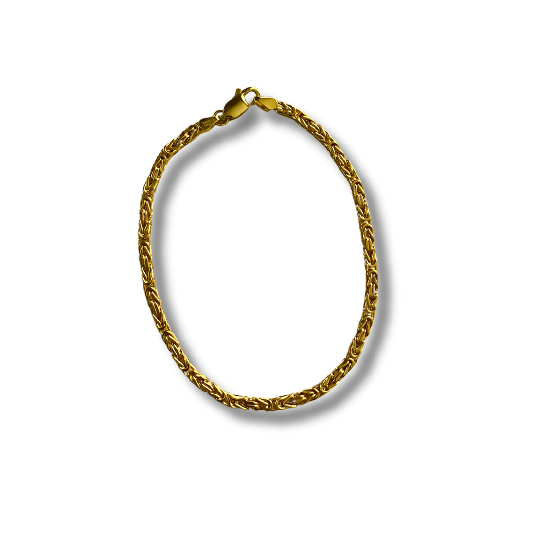 Gold chain bracelet on a white background